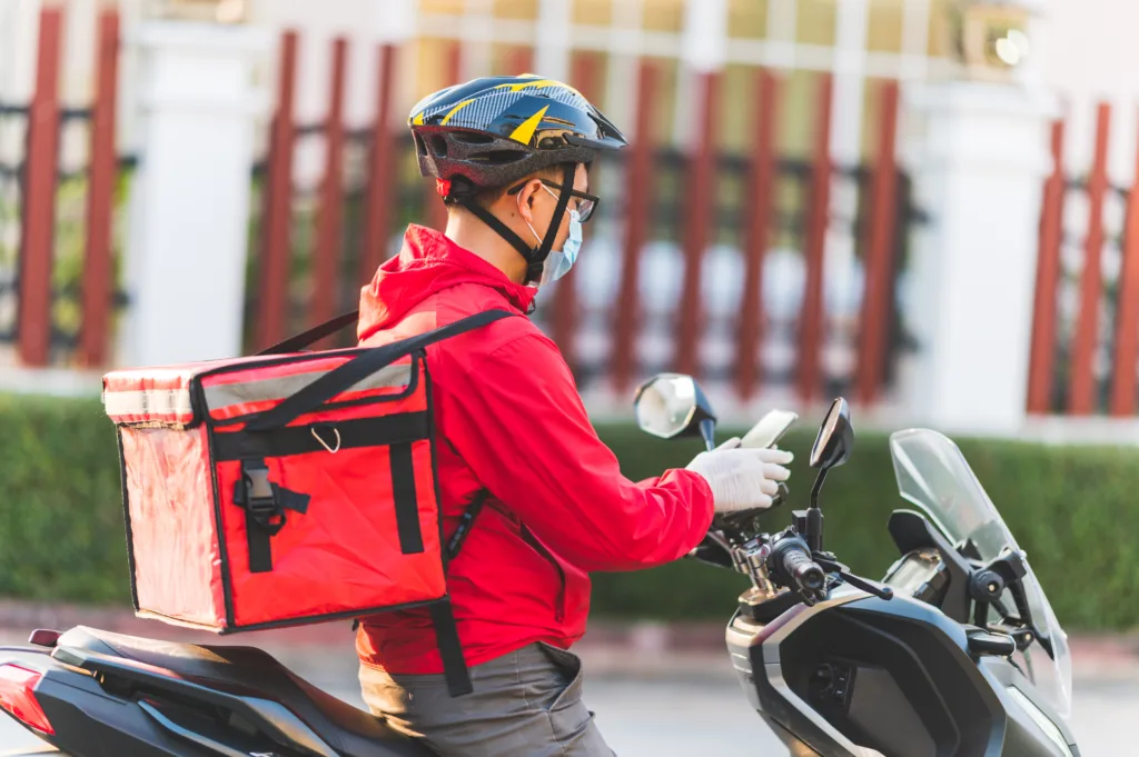 Man delivering food as a side hustle